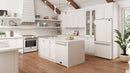 Forno Espresso 30-Inch 5 Cu. Ft. Electric Range with 4 Elements in White with Brass Handle shown in a styled kitchen, view 2