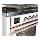 ILVE Majestic III 60-inch Dual Fuel Range with 7 Natural Gas Burner, Griddle, French Top and Triple Glass Door Electric Oven in White with Copper Trim (UM60FSNR3WHP)