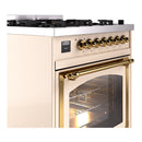 Antique white dual fuel range control panel with brass knobs and brass-trimmed oven door