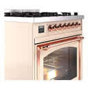 Antique white dual-fuel range with copper-trimmed oven handle and control knob panel