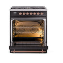 Open oven cavity with racks and warm light, copper-trim door frame on dual fuel range
