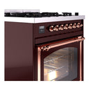 Burgundy dual-fuel range with copper control knob set and open oven door