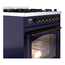 Midnight blue range with bronze control knobs and illuminated oven window