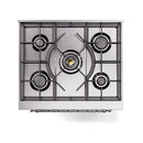 ILVE dual fuel range cooktop with four burners on blue grey body and chrome trim