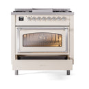 Dual fuel range with closed oven door window and open storage drawer