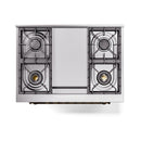 Blue grey cooktop with four gas burners and removable grates