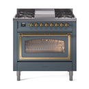 Blue-grey dual fuel gas range with open oven door, brass trim, and six round control knobs