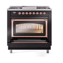 ILVE glossy black dual fuel range with open oven door, copper handle, and lit interior