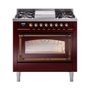 Burgundy dual fuel range with bronze-trim oven window and front control knobs