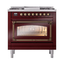 Burgundy dual-fuel range with bronze control knobs and closed oven door, triple glass