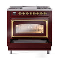 Burgundy gas range with brass trim, glowing oven window and decorative brass door handle.