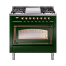 Emerald green dual fuel range with oven window and bronze control knobs