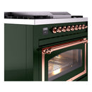 Emerald green gas range with copper control knobs and oven door window