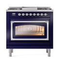 ILVE dual fuel range with open oven door, lit interior, chrome handle, midnight blue