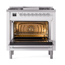 White dual-fuel range with open oven showing racks behind triple-pane glass