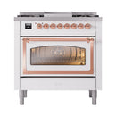 White dual fuel range with copper-trim control knobs and large windowed oven door