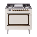 Antique white ILVE dual fuel range with bronze control trim and solid oven door