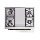 Antique white ILVE dual fuel cooktop with four cast burners and metal grates