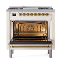 Antique white dual fuel range with open brass-trim oven door and racks