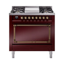 Burgundy dual-fuel range front with control knobs and oven door with bronze trim