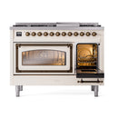 Freestanding range with left oven lit and right oven open; bronze trim and knobs