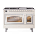 Antique white freestanding dual fuel range with chrome control knobs and closed oven doors