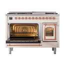 Dual fuel range with open ovens and copper-trimmed handles, antique white