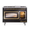 Glossy black range with brass-trimmed open oven door and small oven window section
