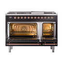 Freestanding dual-fuel gas range, black with copper trim, both ovens open and illuminated