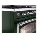 Emerald green range side view with chrome control knobs and open oven door