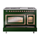 Emerald green dual fuel range with both oven doors open and copper-trim handles.