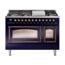 Midnight blue dual fuel range with bronze-trim knobs and two lit ovens