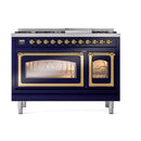 Midnight blue dual fuel freestanding range with brass-trimmed dual ovens and control panel.