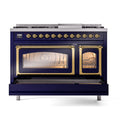 Midnight blue freestanding range with both oven doors closed; brass-trimmed doors and knobs.