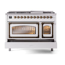 Freestanding dual fuel range front view with bronze trim and closed burner grates