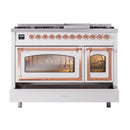 Freestanding dual fuel gas range with both oven doors closed and copper-trimmed door frames