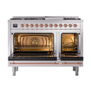 Stainless steel dual oven range with both oven doors open, copper trim, and burner grates