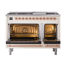 Antique white dual fuel freestanding range with copper-trim control panel and open ovens
