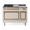 Antique white gas range with griddle and dual oven doors, brass-trimmed burners