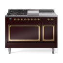 Burgundy dual-fuel range with griddle, gas burners, and brass-handled oven doors