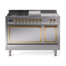 Stainless steel dual fuel range with brass-trim knobs, burners, and two oven doors
