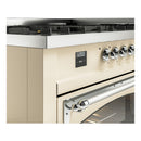 Dual fuel range control panel with lit display, chrome knobs, and oven door handle