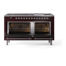 Burgundy dual fuel gas range with two open ovens, visible racks, and warm interior light.