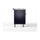 Midnight blue side panel of dual fuel range with brass hardware and small control detail