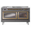 Matte graphite dual-fuel range front with brass-trim oven doors and row of burner knobs
