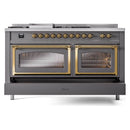Matte graphite dual fuel range with brass-framed dual ovens and control knobs across top