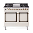 Antique white dual-fuel gas range with two closed solid oven doors and bronze knobs