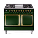 Emerald green dual-fuel gas range with brass-trim knobs and twin closed oven doors