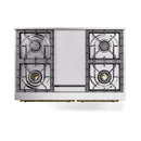 Dual fuel cooktop with four burners, center control panel, and brass trim