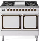 White dual-fuel gas range with bronze knobs and two solid-door ovens, front view